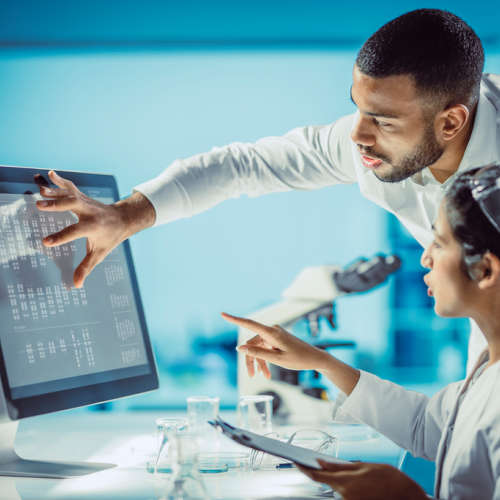Colleagues reviewing tests