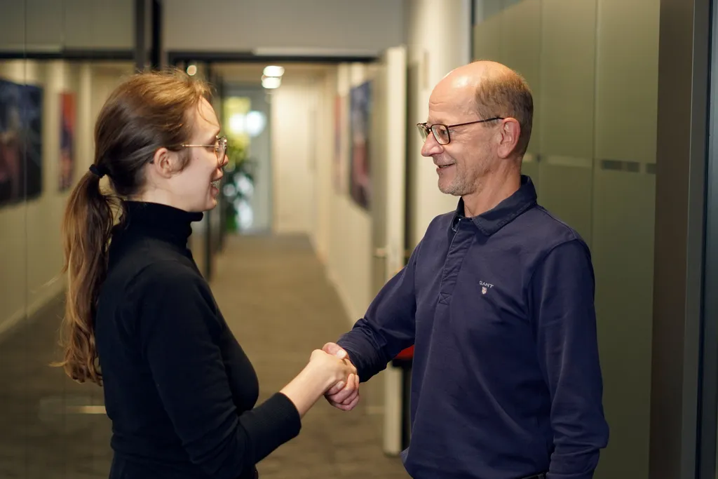 Professional handshake symbolizing partnership and collaboration